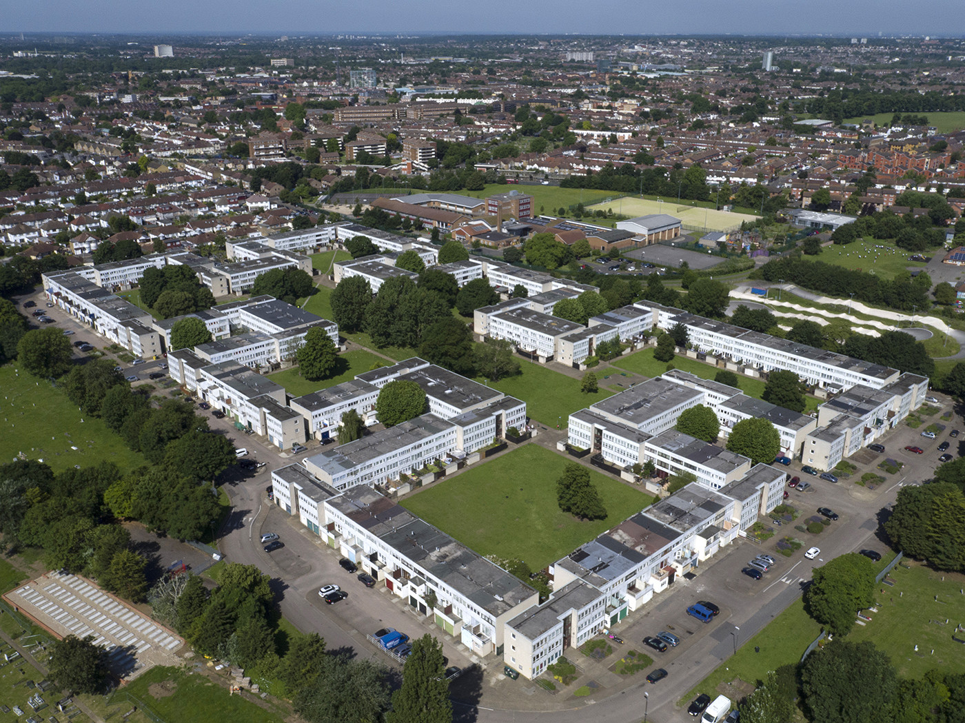 An aerial photo of the Eastfields estate, a post-war estate with a central green in the middle.